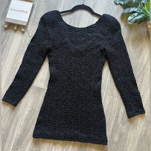 Vintage 80’s smocked popcorn bodycon dress in black. Size O/S